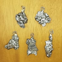 c22a91d4-bb96-5955-b50b-7915abb0b49b.jpg Meteorite Pendants | Campo Del Cielo