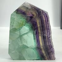 15fb60d7-7c48-5e60-bd8d-ff1e35d635df-1.jpg Rainbow Fluorite Polished Point -Live Edge | 2.G