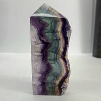 c5292ac4-31ad-5c36-8233-acedfe59b5dd-1.jpg Rainbow Fluorite Polished Point -Live Edge | 2.G