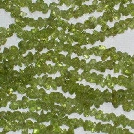 ff49216e-8610-582f-9401-44ae8007d810.jpg Peridot Chip Beads | Package of 100