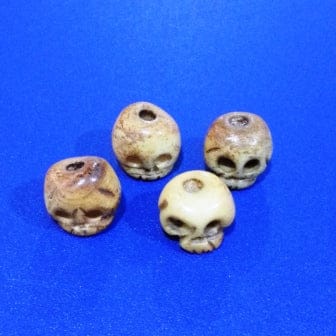 b8c45a06-566f-5c99-9802-5ccd488de476.jpg Skull Bone Beads | Pack of 4