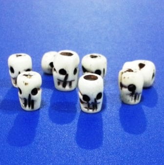 0db68145-1940-5593-8c44-1f51b997bf95.jpg Skull Bone Tube Shaped Beads | Pack of 8