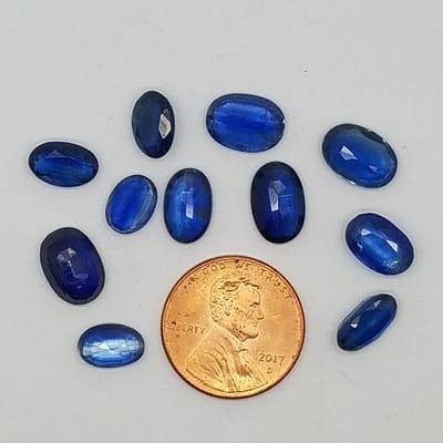 0937de8e-6830-537d-b991-e515db0f2f45.jpg Blue Faceted Oval 10x7mm