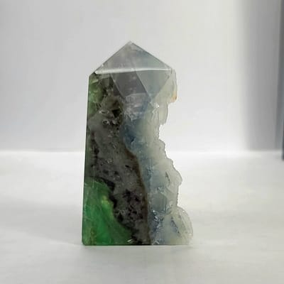 1145ae84-5f03-54dc-9ffd-f8bb480bbf91.jpg Rainbow Fluorite Polished Point -Live Edge | 2.G