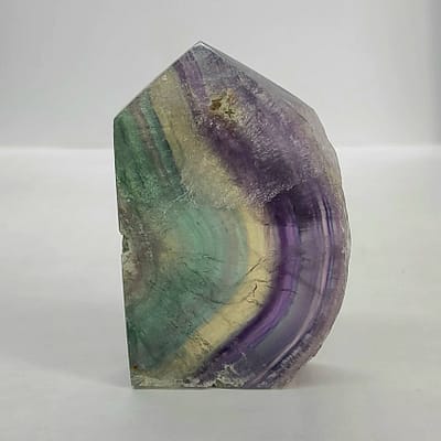 2f07e3e7-f6dc-5f04-b8df-a3453f51a596-1.jpg Rainbow Fluorite Polished Point -Live Edge | 2.G