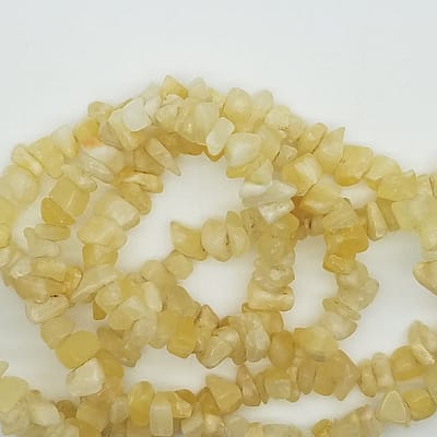 e0c37d6f-8996-5a6d-811b-48111615048d.jpg Yellow Calcite Chip Beads | Package of 100