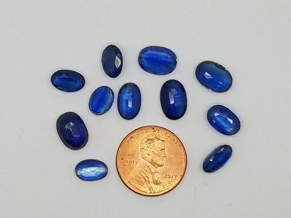 cae2ce79-b6f9-569a-8995-4792f7a7cb73.jpg Blue Faceted Oval 8x5mm