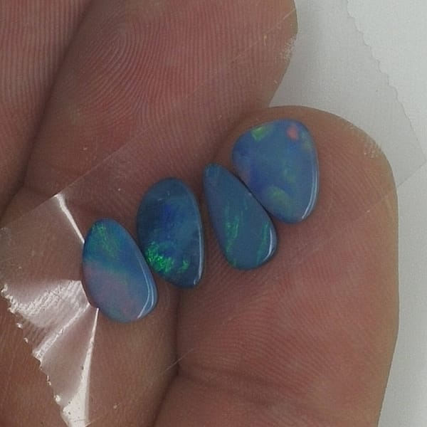 326b4b5e-f574-58f9-9c81-eeac1b383955.jpg OPAL Cabochons | 4 Piece Wholesale | Boulder Opal LOT F