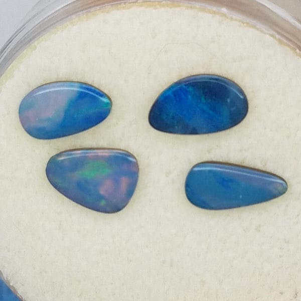 50cc408f-175c-5df0-92e8-3bd581e5905a.jpg OPAL Cabochons | 4 Piece Wholesale | Boulder Opal LOT F