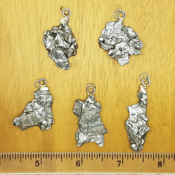 c22c9a72-8b9c-5621-8040-fd7f60061635.jpg Meteorite Pendants | Campo Del Cielo