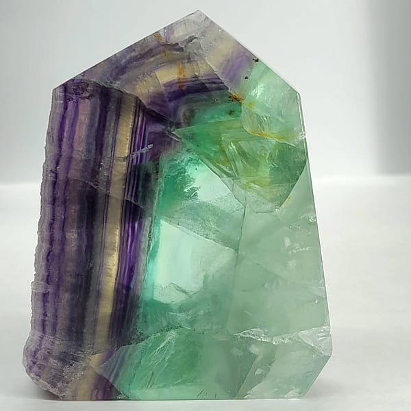 29dd4d41-a32f-5820-9b69-213272268913-1.jpg Rainbow Fluorite Polished Point -Live Edge | 2.G
