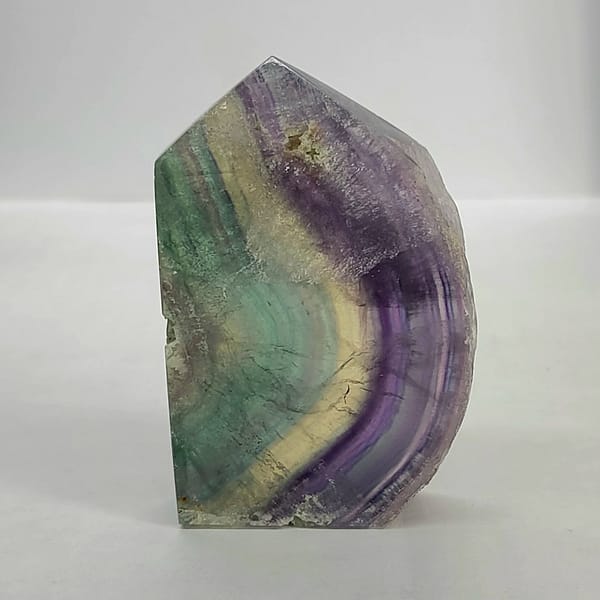2f07e3e7-f6dc-5f04-b8df-a3453f51a596-1.jpg Rainbow Fluorite Polished Point -Live Edge | 2.G