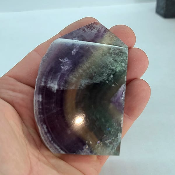 3fcb9832-3fc7-5775-92f4-1767d9b1bfa8-1.jpg Rainbow Fluorite Polished Point -Live Edge | 2.G