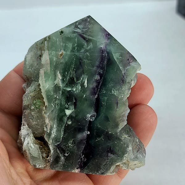 4356402e-9ae7-5f77-8cfc-0177e78f3197-1.jpg Rainbow Fluorite Polished Point -Live Edge | 2.G