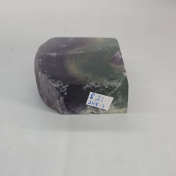 5d96ffd9-f52b-575e-a3e8-f4a860767cb4-1.jpg Rainbow Fluorite Polished Point -Live Edge | 2.G