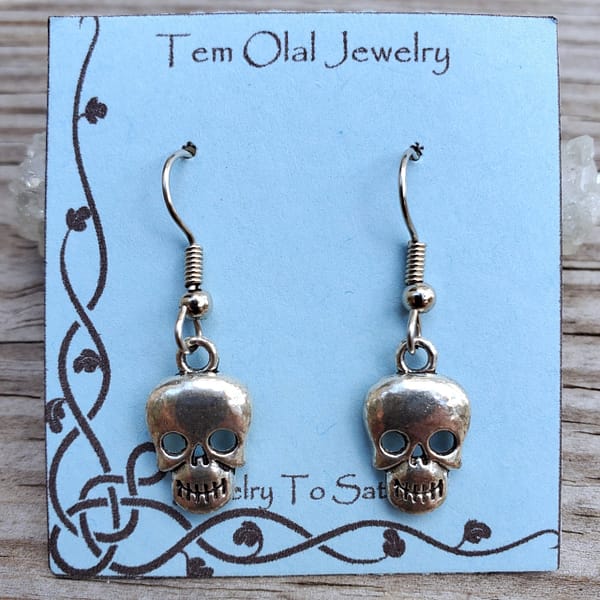 62bd2c9a-58ad-544e-9d01-6ece8016c521.jpg Small Skull Charm Earrings