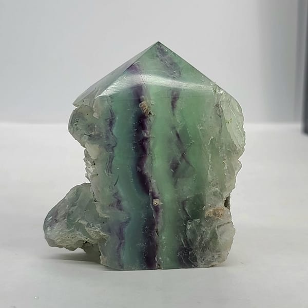 76614943-7991-53b2-8e38-60d10927240d-1.jpg Rainbow Fluorite Polished Point -Live Edge | 2.G