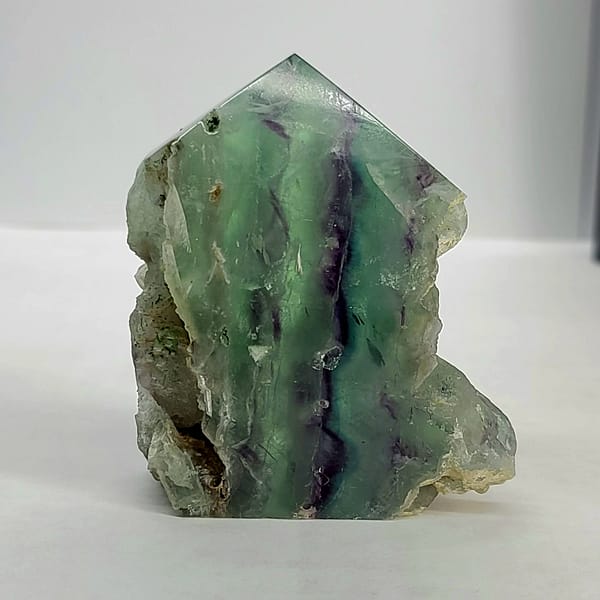 7b48b1de-e3d3-5c63-9de4-6c14c461b7bf-1.jpg Rainbow Fluorite Polished Point -Live Edge | 2.G