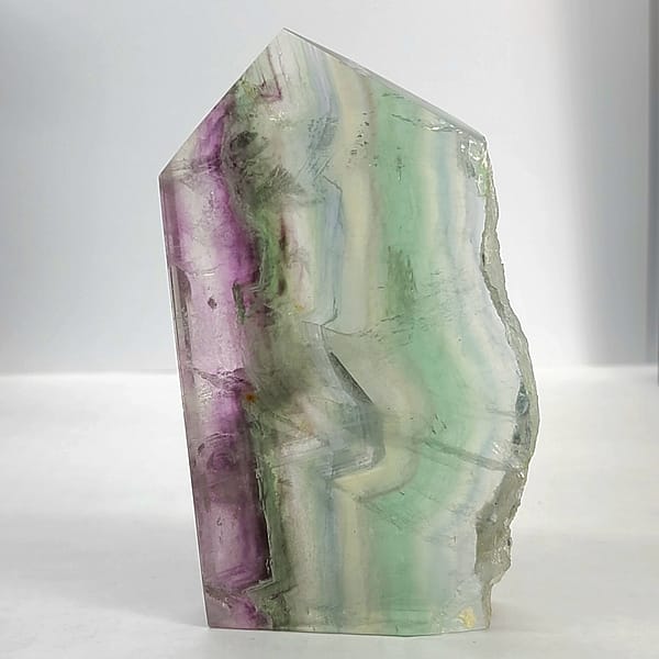fd956779-f129-57bb-822e-5c9cbcba246d.jpg Rainbow Fluorite Polished Point -Live Edge | 2.G